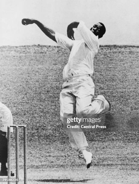 West Indian fast bowler Wes Hall in action, April 1963.
