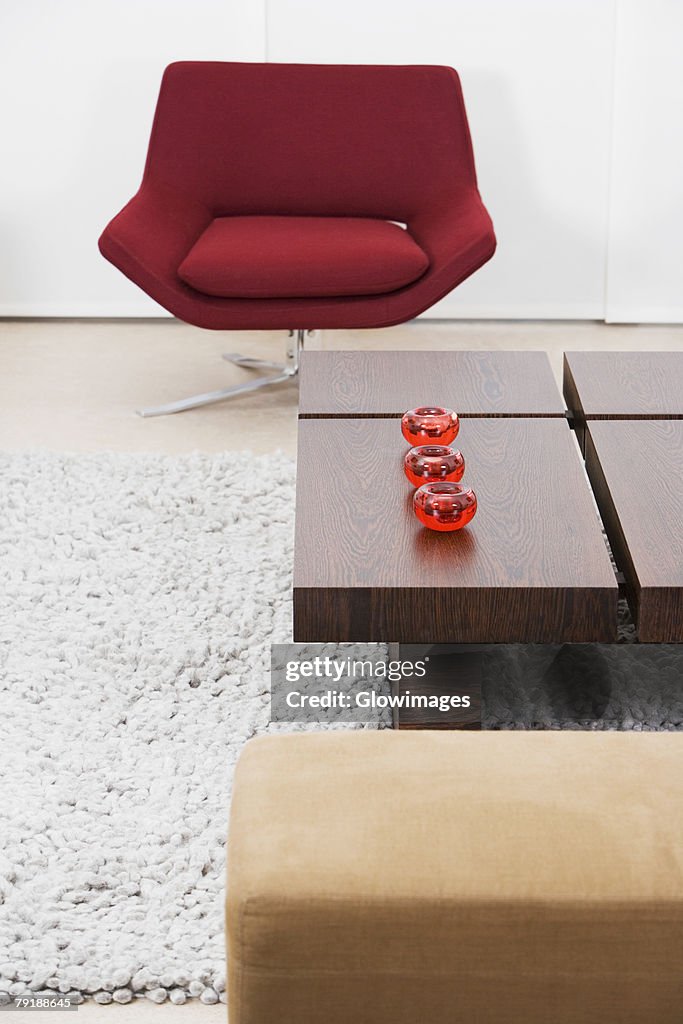 Table and an armchair in a living room