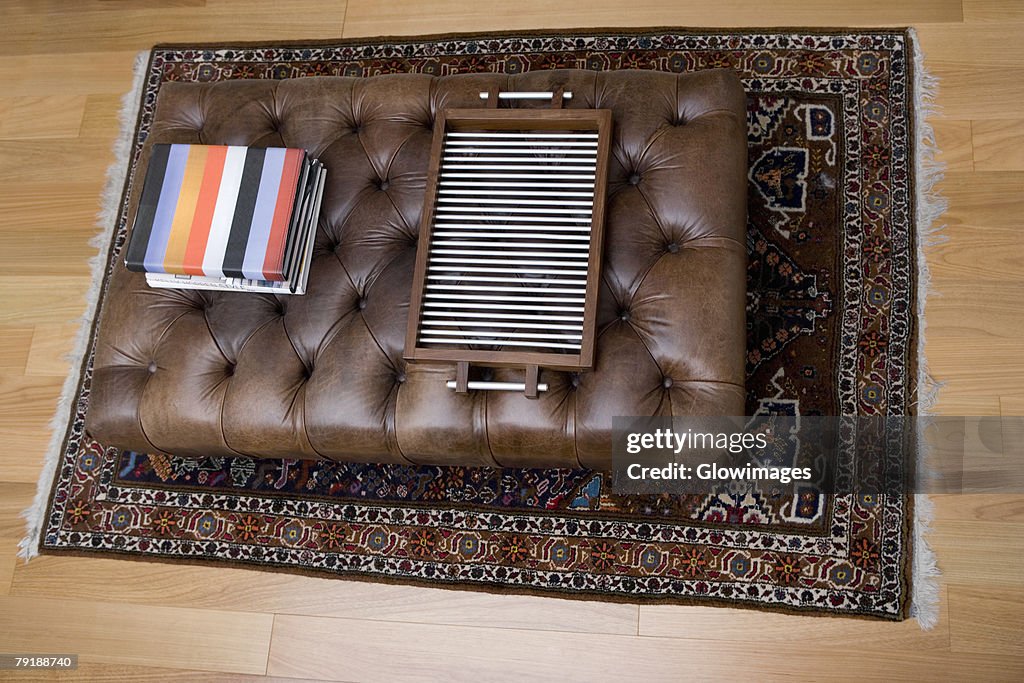 High angle view of a serving tray and towels on a table in a living room