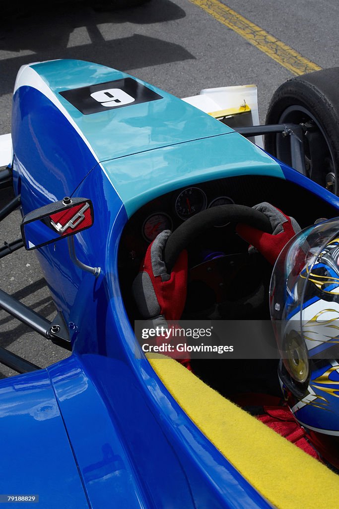 High angle view of a racecar driver in a racecar