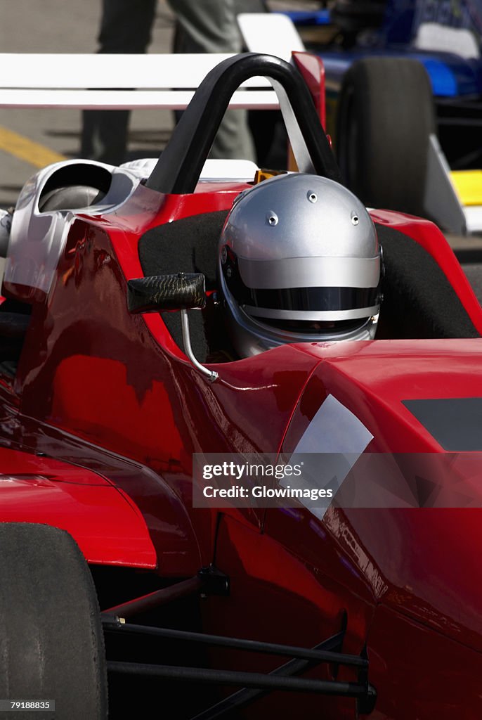 Close-up of a racecar driver in a racecar