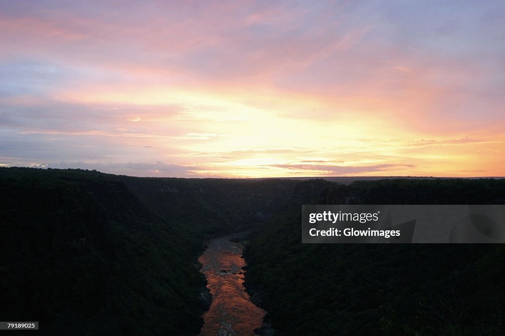 High angle view of a river passing through mountains at sunset, Zambezi River, Zimbabwe
