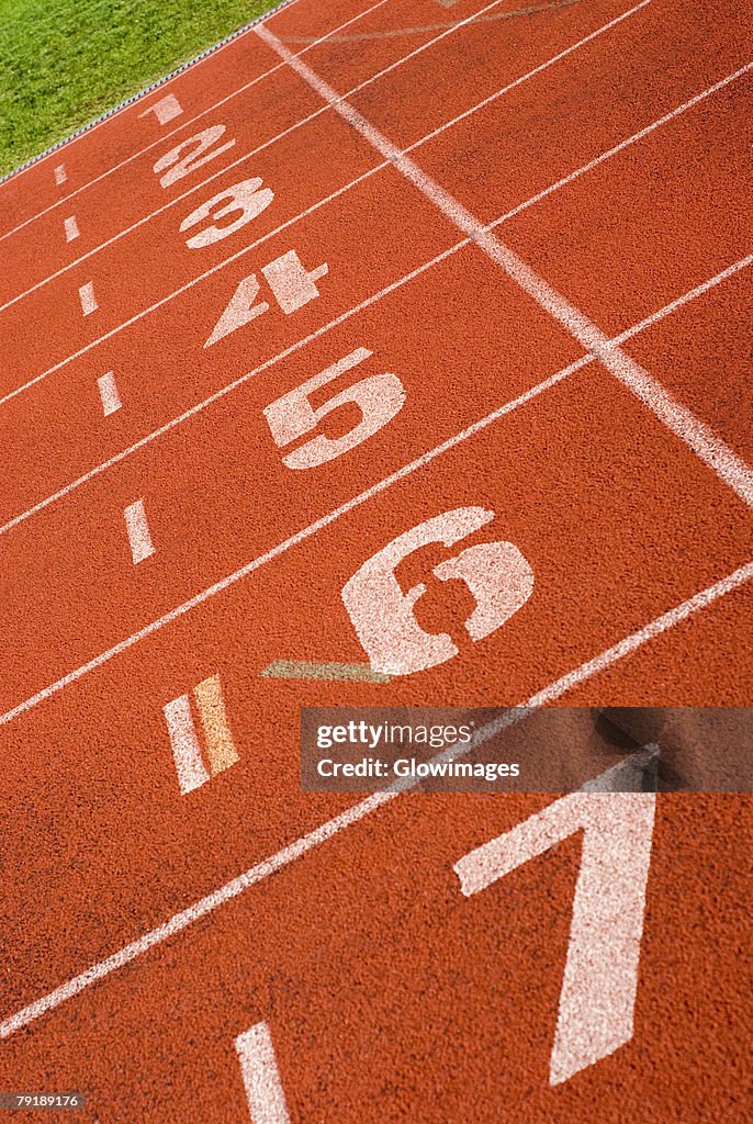 Close-up of track numbers on a running track