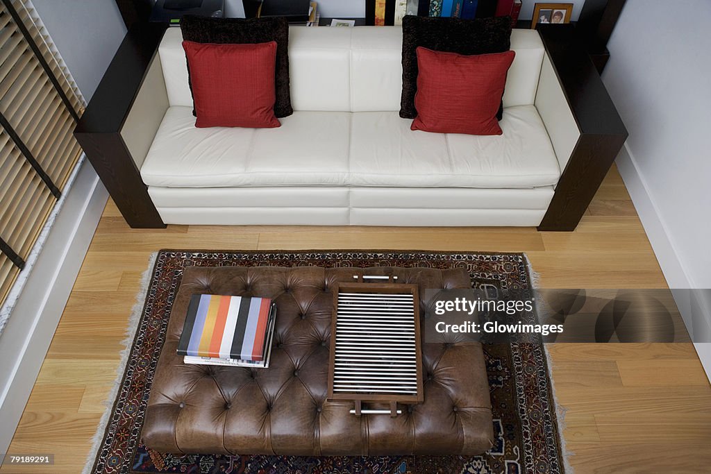 High angle view of a serving tray and towels on a table in a living room