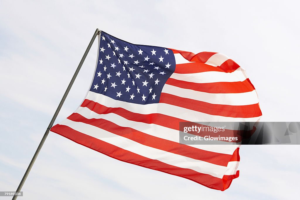 Low angle view of an American flag fluttering, USA