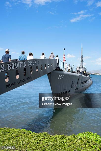 group of people boarding on a military ship, uss bowfin, pearl harbor, honolulu, oahu, hawaii islands, usa - pearl harbor hawaii stock pictures, royalty-free photos & images