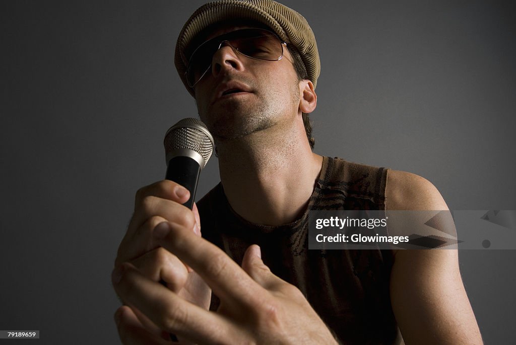 Close-up of a male singer singing