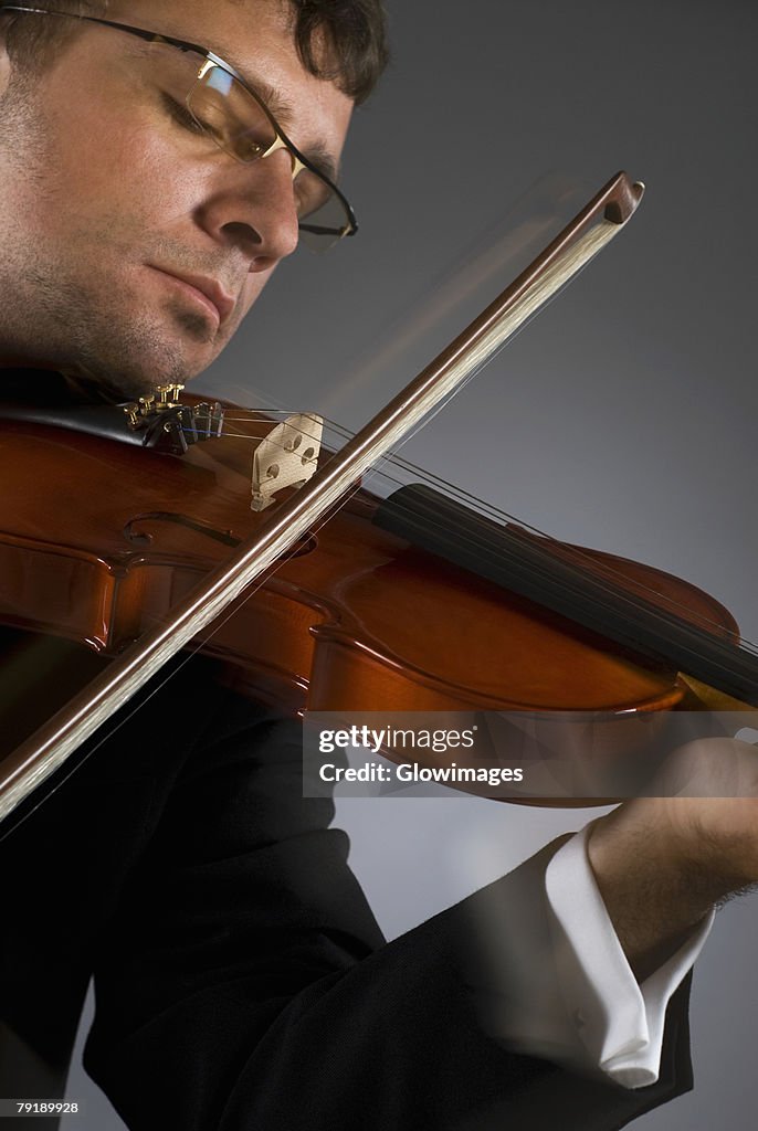 Close-up of a musician playing a violin