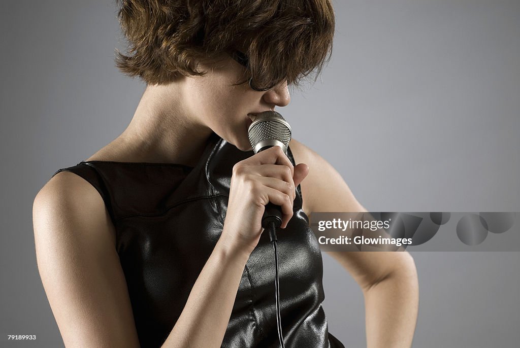 Close-up of a female singer singing