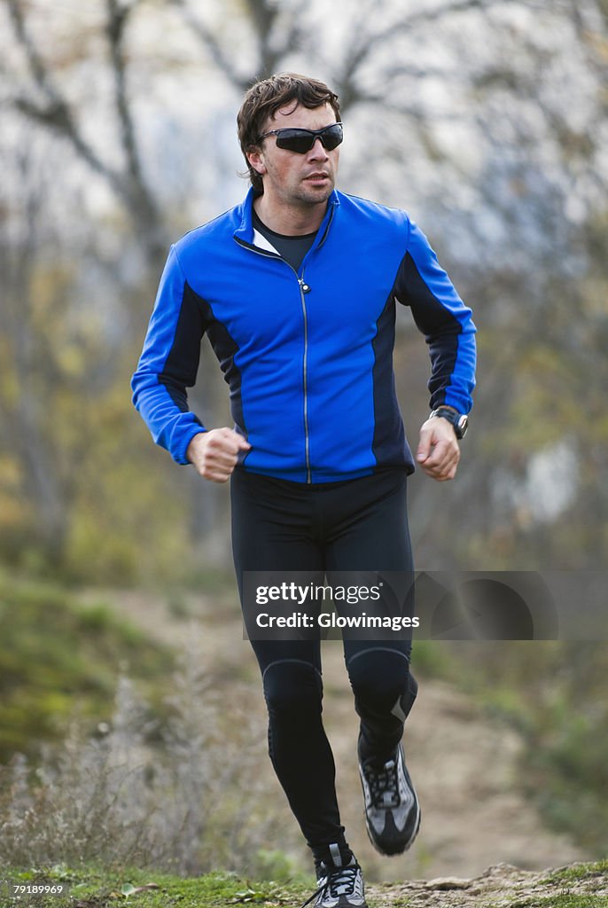 Mid adult man running