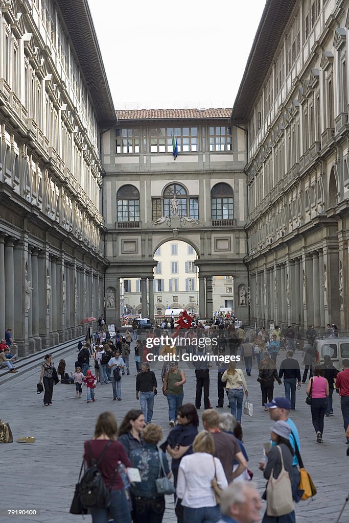 Tourists in the street, Uffizi Museum, Pallazo Vecchio, Florence, Italy