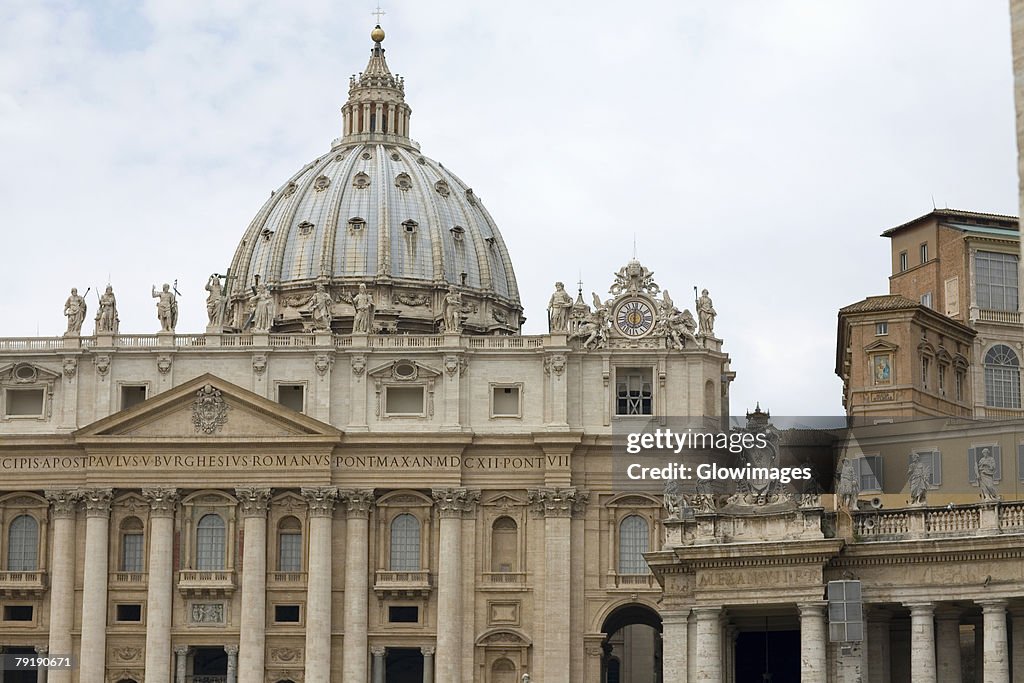 Statues on the wall of a church, St. Peter's Square, St. Peter's Basilica, Vatican, Rome, Italy