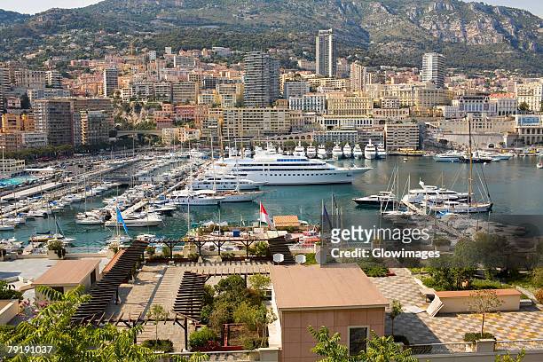 ferries and boats docked at a harbor, port of fontvieille, monte carlo, monaco - harbour of fontvieille stock pictures, royalty-free photos & images