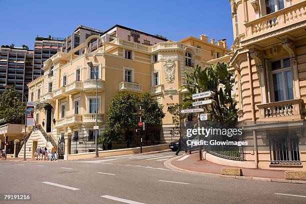 buildings along a road, monte carlo, monaco - monte carlo stock pictures, royalty-free photos & images