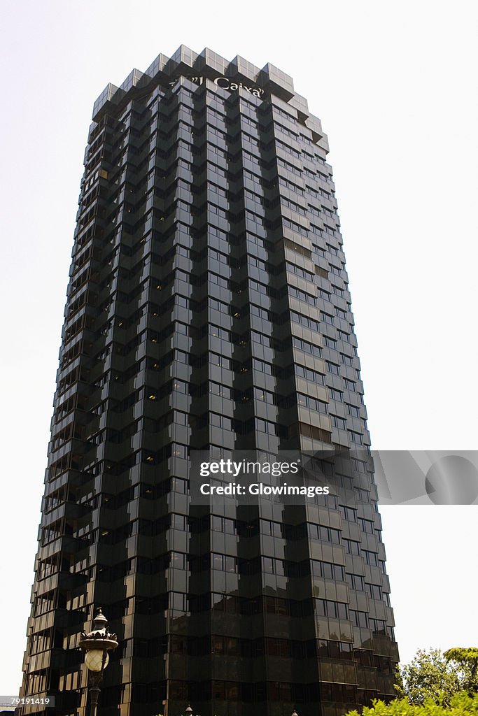 Low angle view of a financial building, La Caixa, Barcelona, Spain