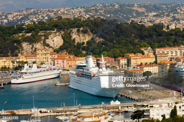 high angle view of cruise ships docked at a harbor, nice, france - nizza foto e immagini stock
