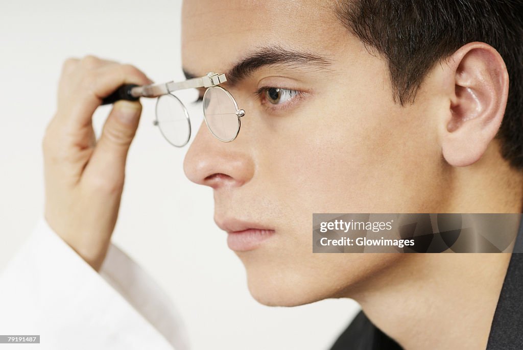 Young man having sight test