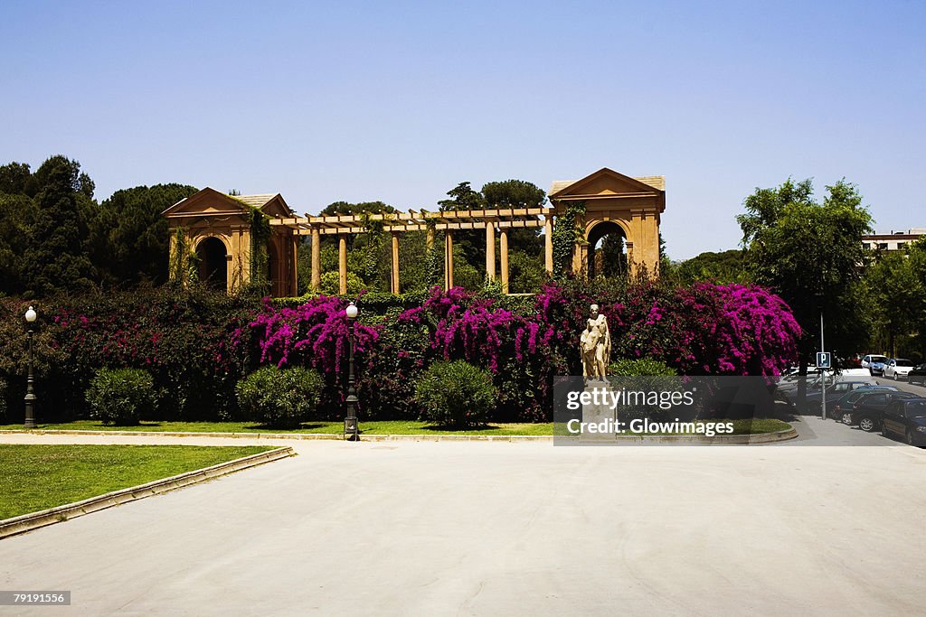 Garden in front of a building, Parc Guell, Barcelona, Spain