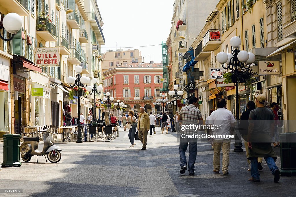 Group of people walking in a market, Nice, France