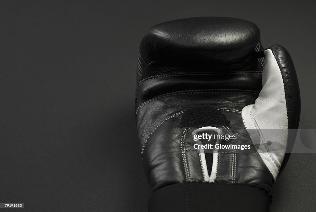 Close-up of a black boxing glove