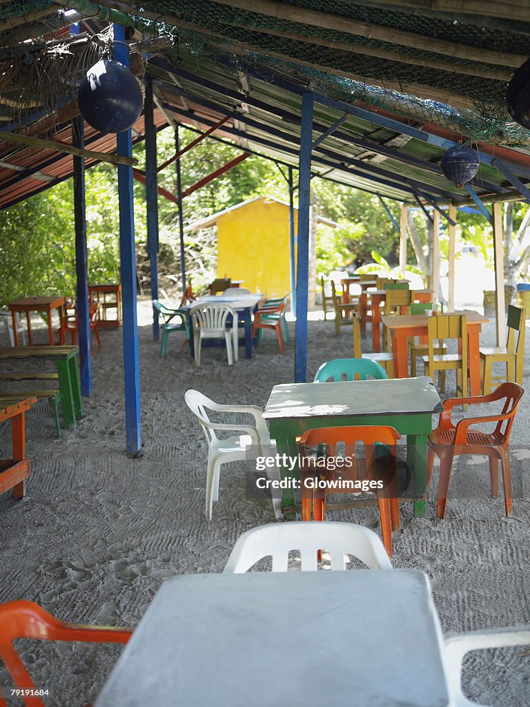 Empty tables and chairs in a restaurant, Providencia, Providencia y Santa Catalina, San Andres y Providencia Department, Colombia