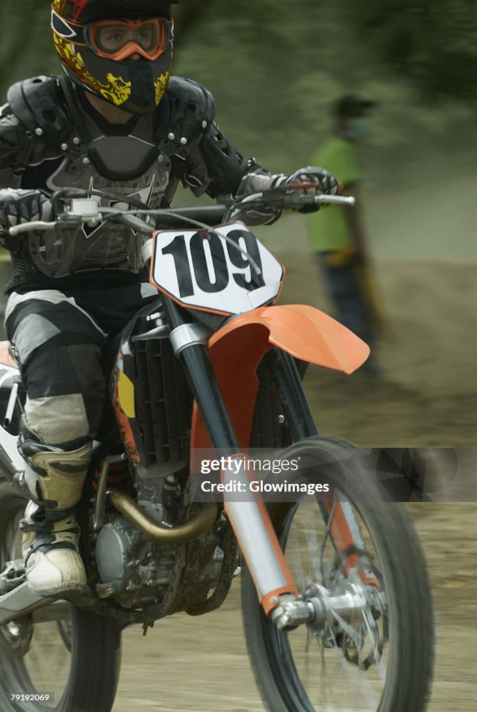 Motocross rider riding a motorcycle