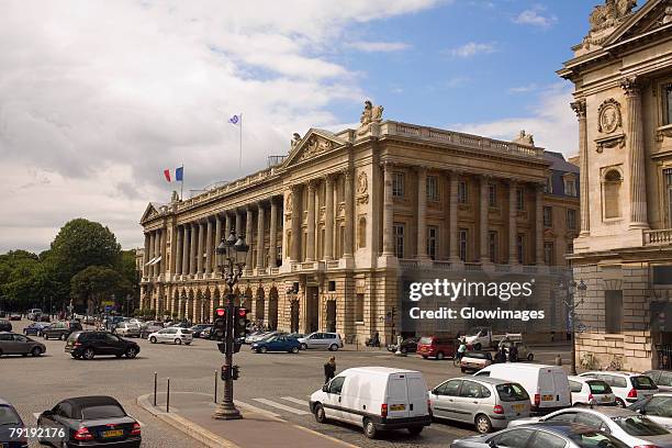 buildings along a road, hotel crillon, paris, france - place de la concorde stock pictures, royalty-free photos & images