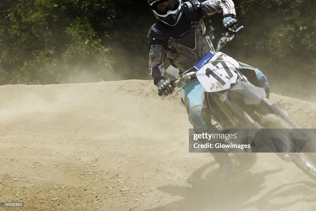 Motocross rider riding a motorcycle