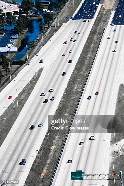 aerial view of vehicles moving on multiple lane highways, interstate 4, orlando, florida, usa - multiple lane highway foto e immagini stock