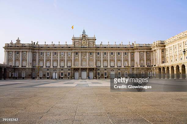 facade of a palace, madrid royal palace, madrid, spain - palace stock pictures, royalty-free photos & images
