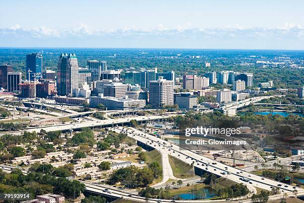 aerial view of buildings in a city, orlando, florida, usa - orlando florida aerial stock pictures, royalty-free photos & images
