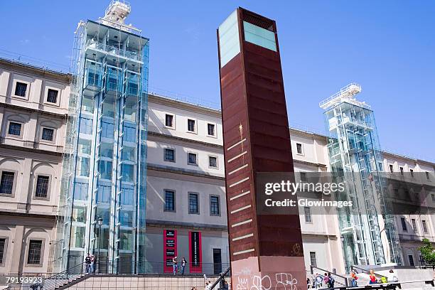 monument in front of a museum, museo nacional centro de arte reina sofia, madrid, spain - museum exterior stock pictures, royalty-free photos & images