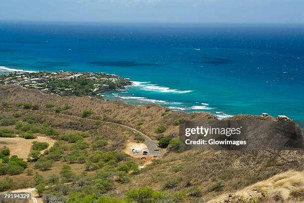 high angle view of a coastline, diamond head, waikiki beach, honolulu, oahu, hawaii islands, usa - diamond head stock pictures, royalty-free photos & images