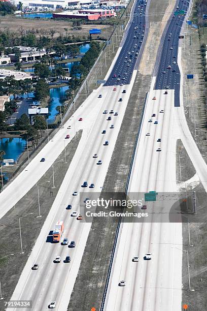 aerial view of vehicles moving on multiple lane highways, interstate 4, orlando, florida, usa - multiple lane highway foto e immagini stock
