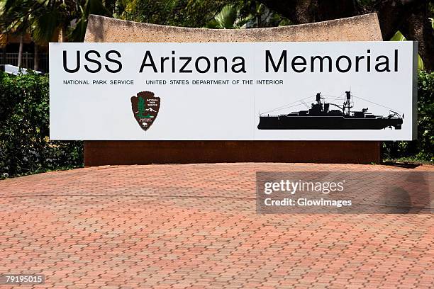 information board in front of a tree, uss arizona memorial, pearl harbor, honolulu, oahu, hawaii islands, usa - uss arizona memorial stock pictures, royalty-free photos & images