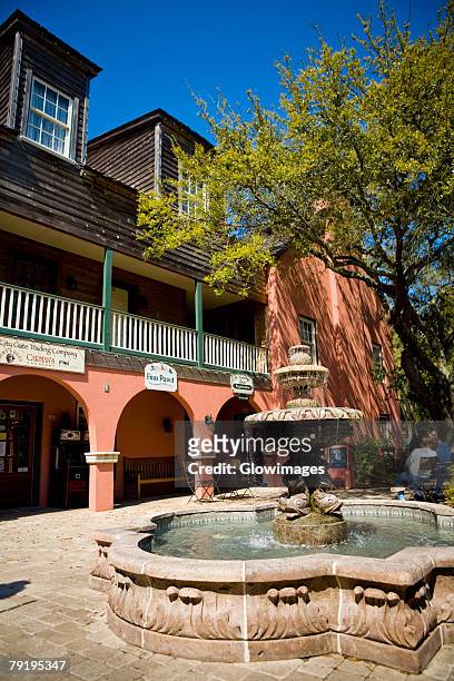fountain in front of a building, st. george street, st. augustine, florida, usa - st augustine florida stock pictures, royalty-free photos & images
