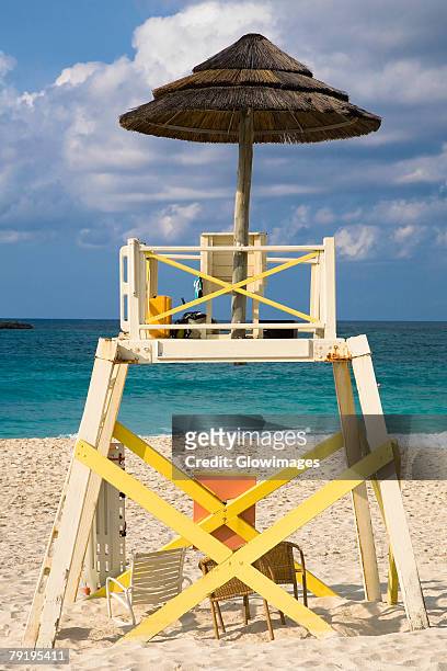 lifeguard hut on the beach, cable beach, nassau, bahamas - cable beach bahamas stock pictures, royalty-free photos & images