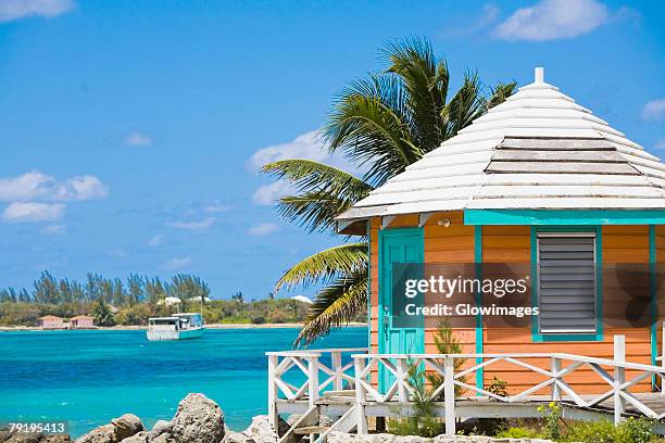 beach hut on the beach, nassau, bahamas - bahamas fotografías e imágenes de stock