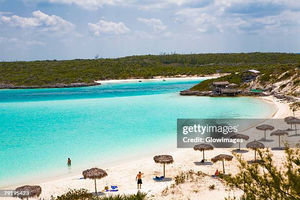 palapa umbrella on the beach, exuma, bahamas - exuma stock pictures, royalty-free photos & images