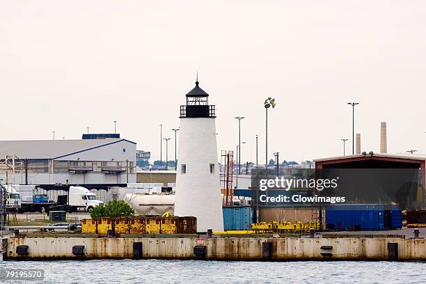 lighthouse at a harbor, inner harbor, baltimore, maryland, usa - インナーハーバー ストックフォトと画像