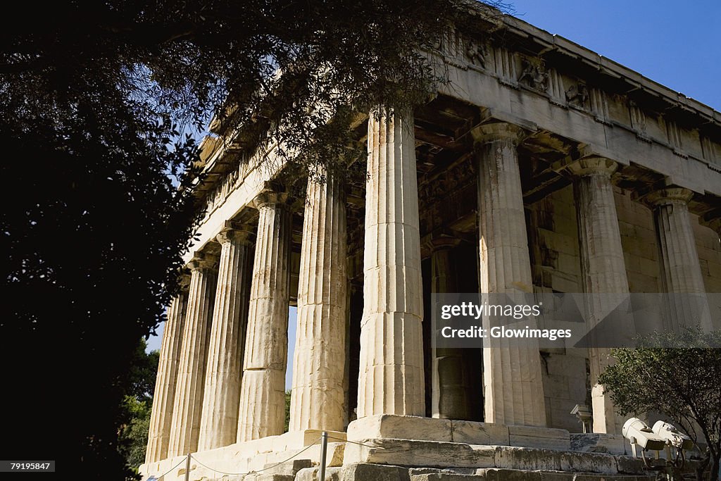 Low angle view of the old ruins of a temple, Parthenon, Acropolis, Athens, Greece