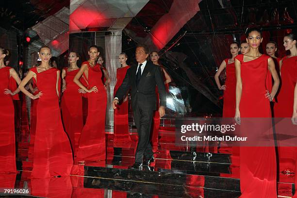 Valentino walks with models on the catwalk for final at the Valentino Fashion show, during Paris Fashion Week Spring-Summer 2008 on January 23, 2008...