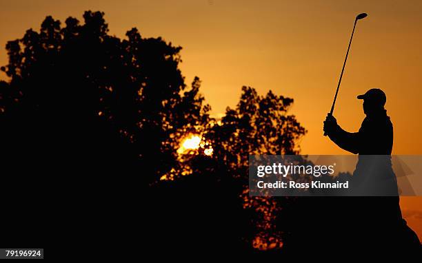 Sergio Garcia of Spain hits his second shot on the 18th hole during the first round of the Commercialbank Qatar Masters at Doha Golf Club on January...