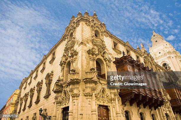 low angle view of a building, archbishop's palace, lima cathedral, lima, peru - peru stock pictures, royalty-free photos & images