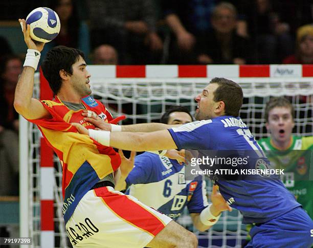 Spain's left back Raul Entrerrios Rodriguez vies with Iceland's pivot Sverre Jakobsson during their 8th Men's European Handball Championship Main...