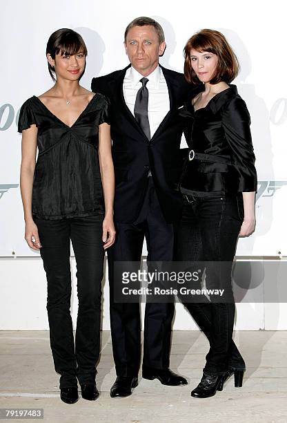 Actors Olga Kurylenko, Daniel Craig and Gemma Arterton attend a photocall to celebrate the start of production of the 22nd James Bond film 'Quantum...