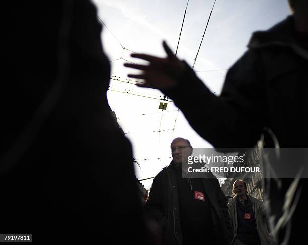 French teachers and other public service employees demonstrate in a street of Lyon, southeastern France, to protest against against jobs' cuts and...