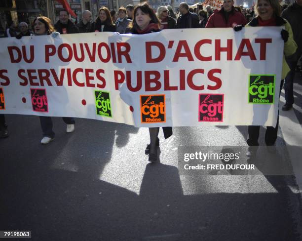 French teachers and other public service employees demonstrate in a street of Lyon, southeastern France, to protest against against jobs' cuts and...