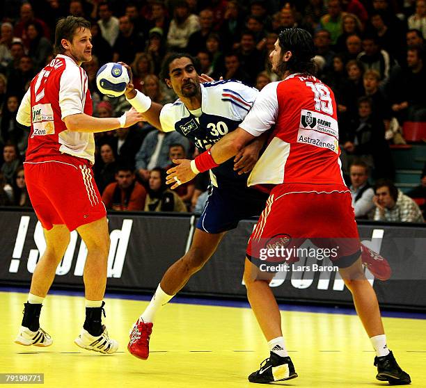 Fabrice Guilbert of France in action with Laszlo Nagy of Hungary during the Men's Handball European Championship main round Group II match between...