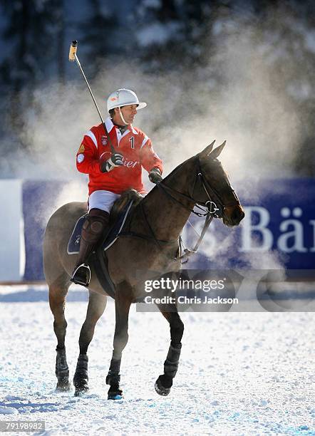 Adriano Agosti of Team Cartier in action during a match against Team Maybach during the first day of the 24th Cartier Polo World Cup on Snow on...